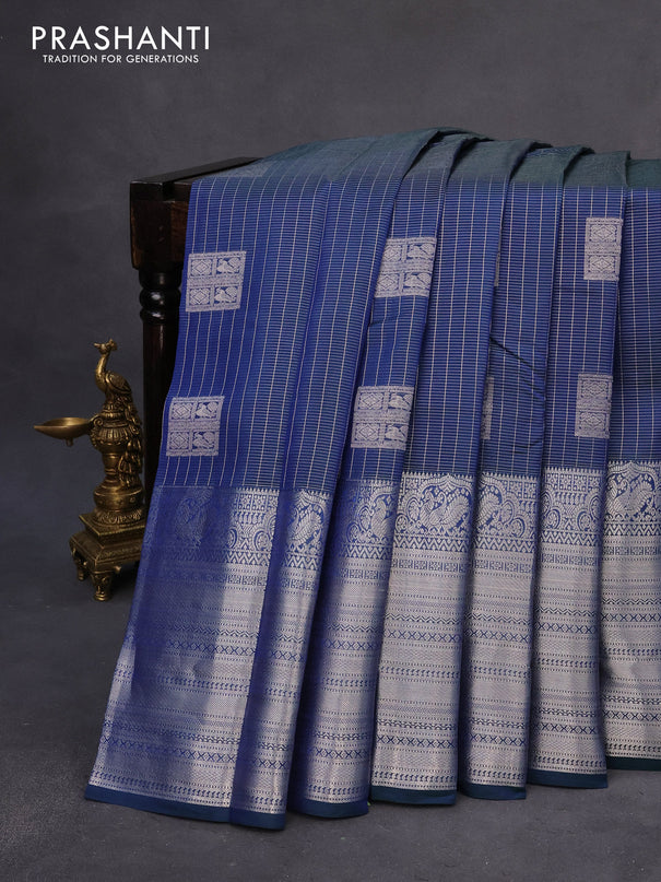 Roopam silk saree dual shade of blue and pastel green with allover silver zari weaves & buttas and long silver zari woven border