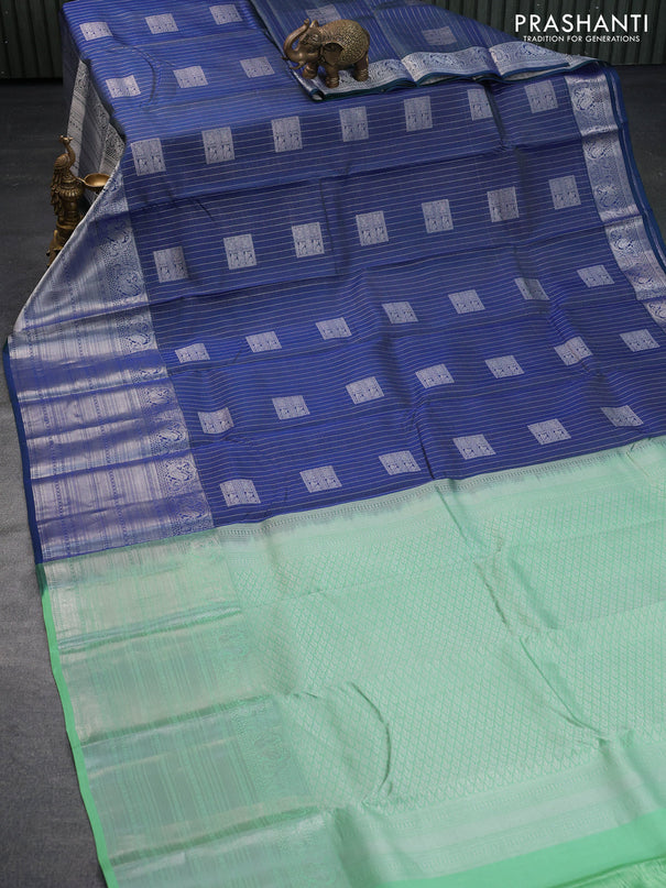 Roopam silk saree dual shade of blue and pastel green with allover silver zari weaves & buttas and long silver zari woven border