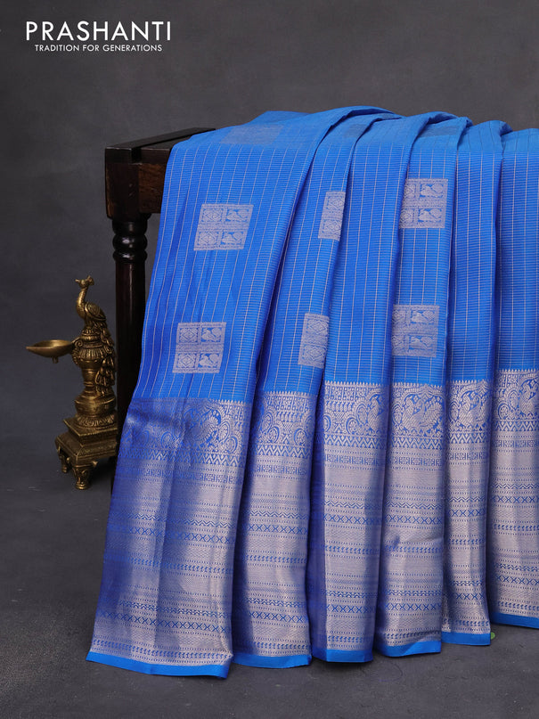 Roopam silk saree cs blue and deep maroon with allover silver zari weaves & buttas and long silver zari woven border