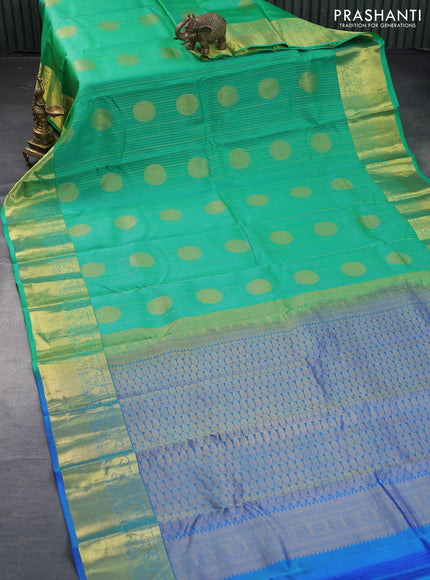 Roopam silk saree teal green and blue with allover zari weaves & buttas and zari woven border