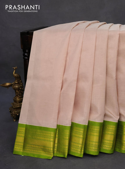 Kuppadam silk cotton saree cream and light green with plain body and zari woven border