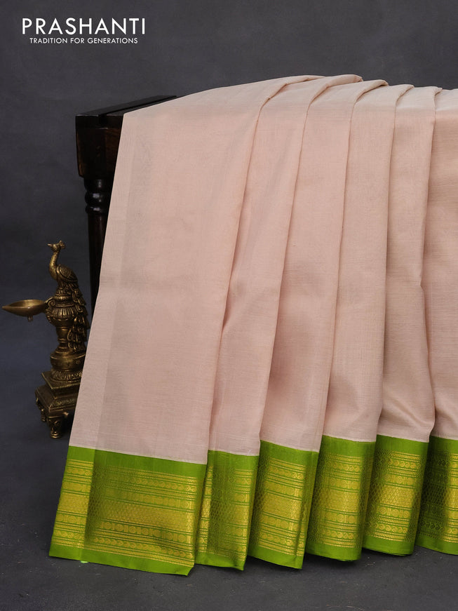 Kuppadam silk cotton saree cream and light green with plain body and zari woven border