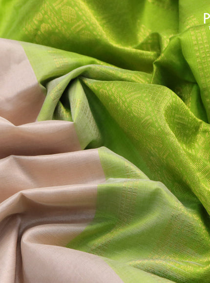 Kuppadam silk cotton saree cream and light green with plain body and zari woven border