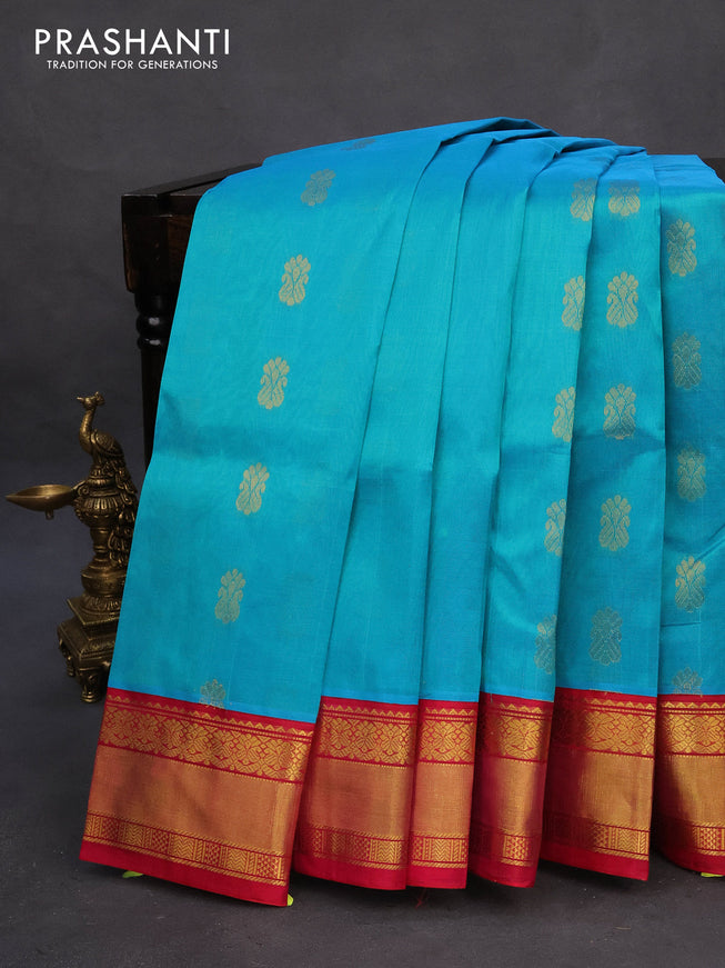 Kuppadam silk cotton saree dual shade of teal blue and pink with zari woven buttas and zari woven border