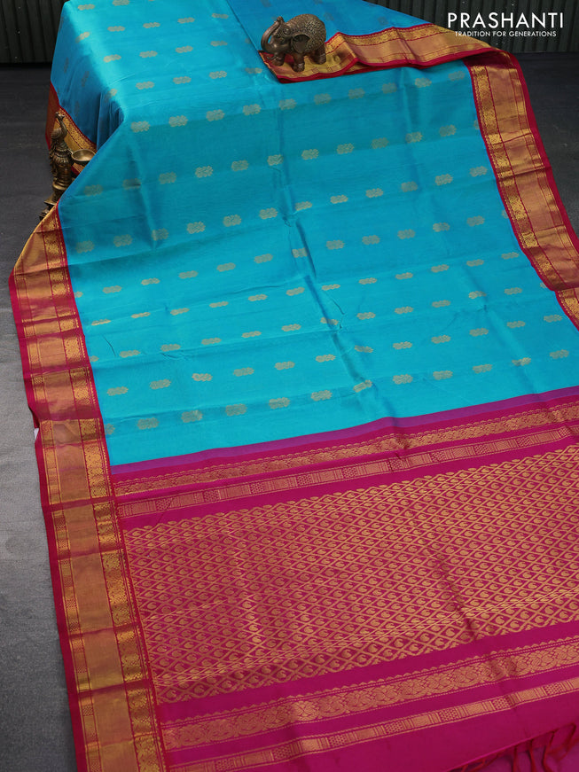 Kuppadam silk cotton saree dual shade of teal blue and pink with zari woven buttas and zari woven border