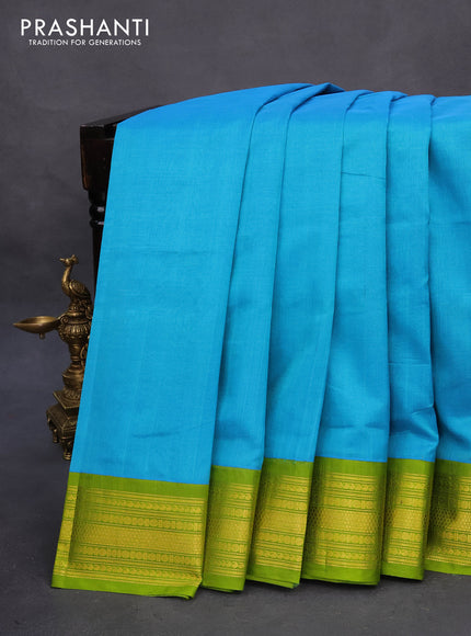 Kuppadam silk cotton saree light blue and light green with plain body and zari woven border