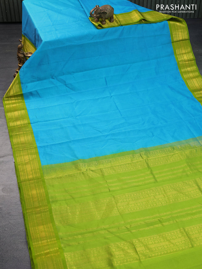 Kuppadam silk cotton saree light blue and light green with plain body and zari woven border