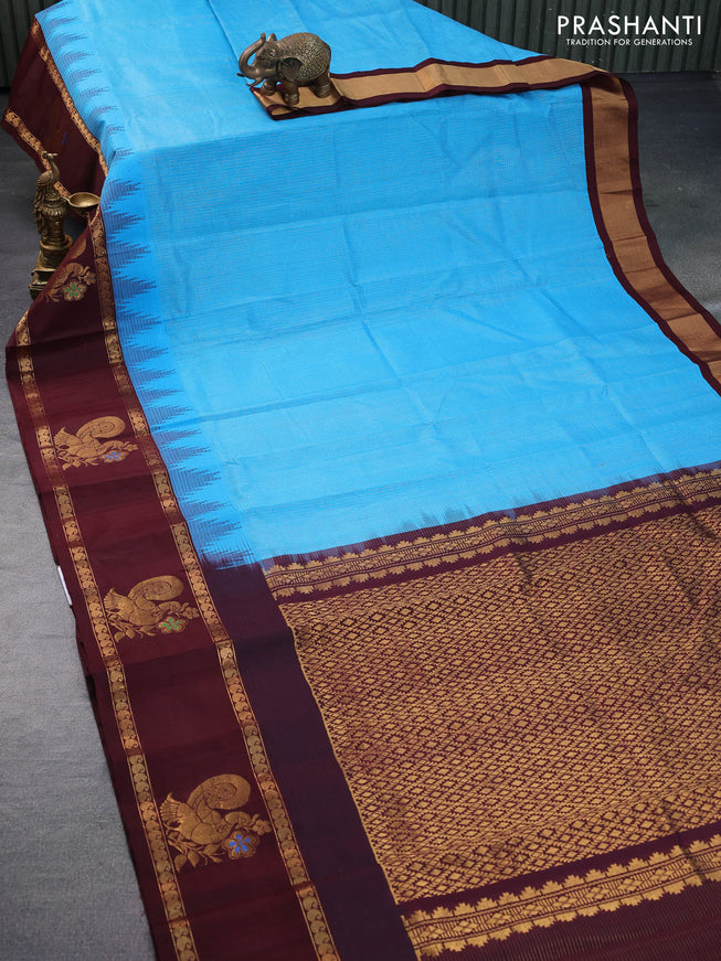 Kuppadam silk cotton saree blue and deep maroon with allover zari checks & buttas and temple design zari woven butta border