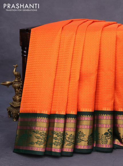 Kuppadam silk cotton saree orange and bottle green with allover zari checks & buttas and peacock design zari woven border