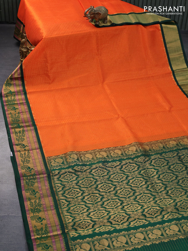 Kuppadam silk cotton saree orange and bottle green with allover zari checks & buttas and peacock design zari woven border