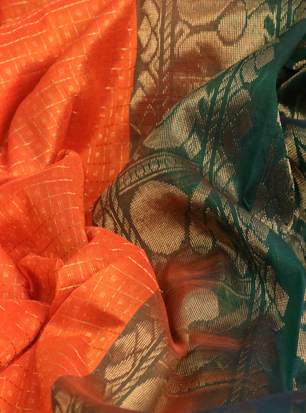 Kuppadam silk cotton saree orange and bottle green with allover zari checks & buttas and peacock design zari woven border