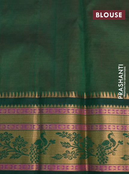 Kuppadam silk cotton saree orange and bottle green with allover zari checks & buttas and peacock design zari woven border