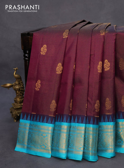 Kuppadam silk cotton saree dark purple and teal blue with allover zari weaves & buttas and temple design zari woven border