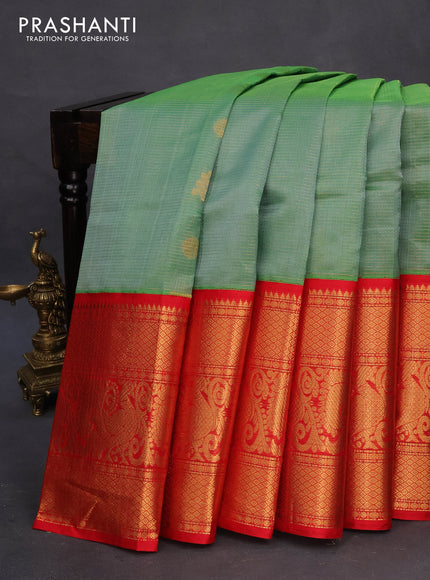 Kuppadam silk cotton saree pastel green and red with allover zari weaves & buttas and long annam zari woven border