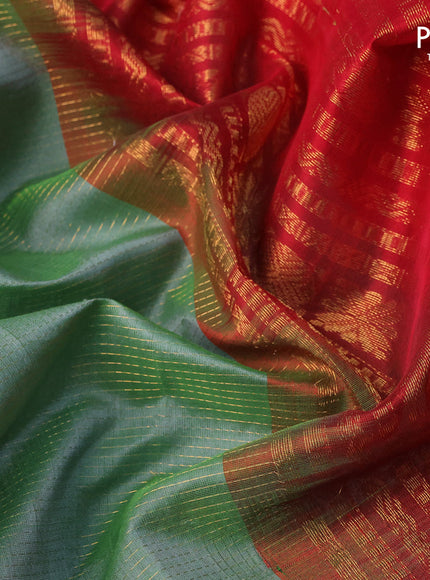 Kuppadam silk cotton saree pastel green and red with allover zari weaves & buttas and long annam zari woven border