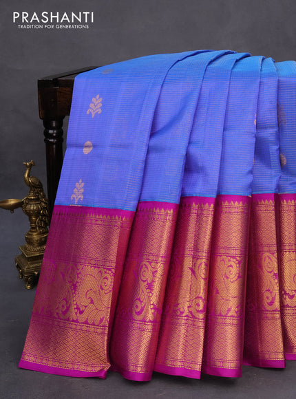 Kuppadam silk cotton saree blue and purple with allover zari weaves & buttas and long annam zari woven border