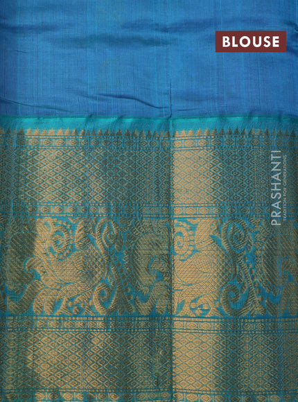 Kuppadam silk cotton saree blue and teal blue with allover zari weaves & buttas and long annam zari woven border