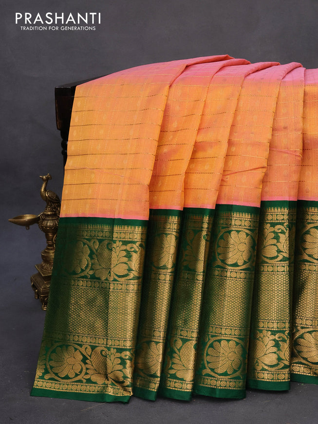 Kuppadam silk cotton saree dual shade of pinkish yelllow and green with allover zari checks & buttas and long zari woven border