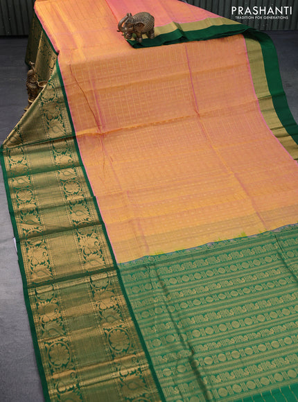 Kuppadam silk cotton saree dual shade of pinkish yelllow and green with allover zari checks & buttas and long zari woven border