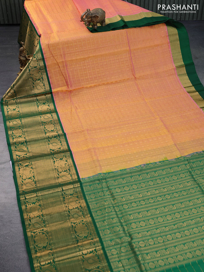 Kuppadam silk cotton saree dual shade of pinkish yelllow and green with allover zari checks & buttas and long zari woven border