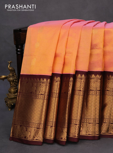 Kuppadam silk cotton saree dual shade of light pinkish yelllow and deep coffee brown with allover zari weaves & buttas and long zari woven border