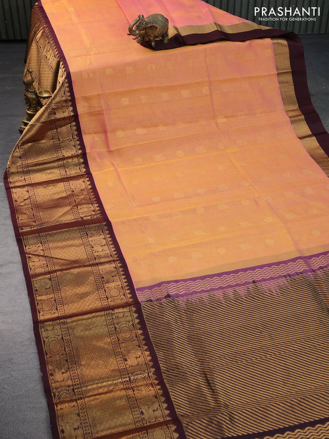 Kuppadam silk cotton saree dual shade of light pinkish yelllow and deep coffee brown with allover zari weaves & buttas and long zari woven border