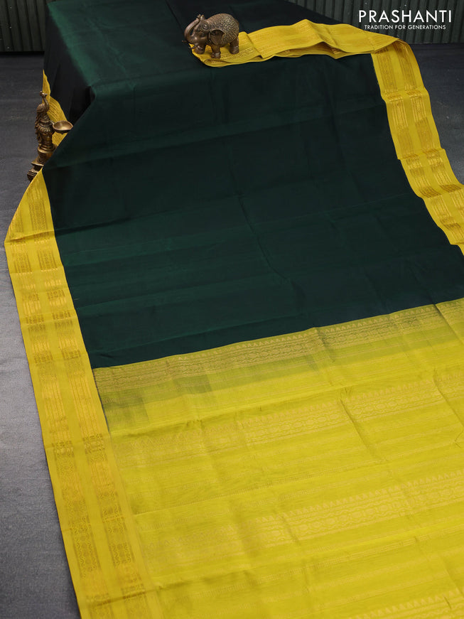 Silk cotton saree bottle green and lime yellow with plain body and zari woven korvai border