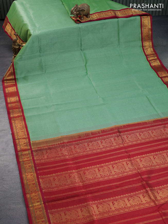 Silk cotton saree green shade and maroon with allover vairaosi pattern and annam zari woven korvai border