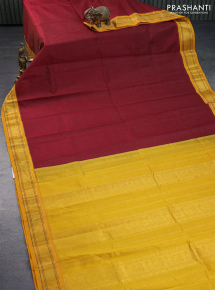 Silk cotton saree maroon and mango yellow with allover vairaosi pattern and annam zari woven korvai border