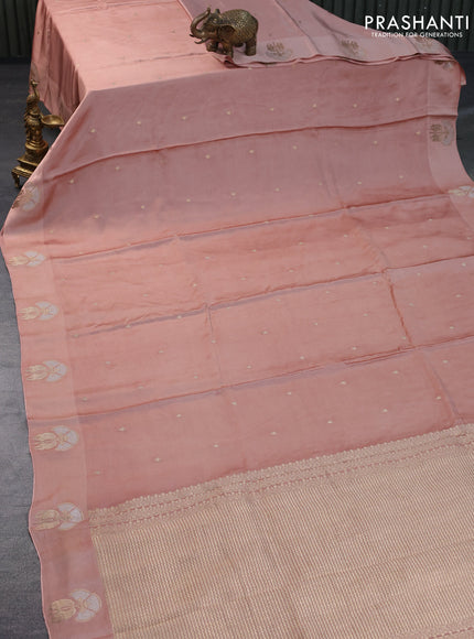 Mushru silk saree peach shade with zari woven buttas and zari woven butta border