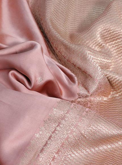 Mushru silk saree peach shade with zari woven buttas and zari woven butta border