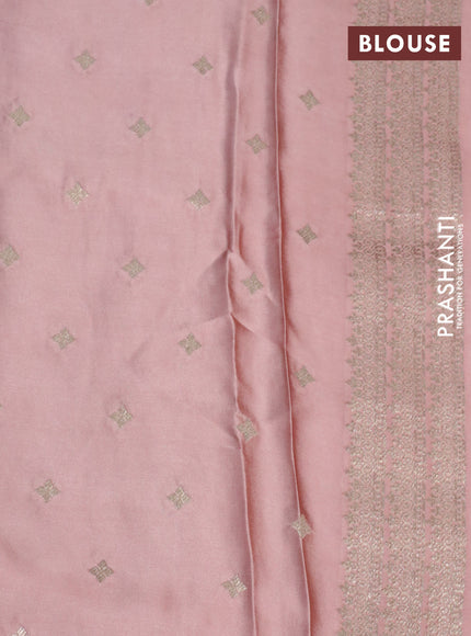 Mushru silk saree peach shade with zari woven buttas and zari woven butta border