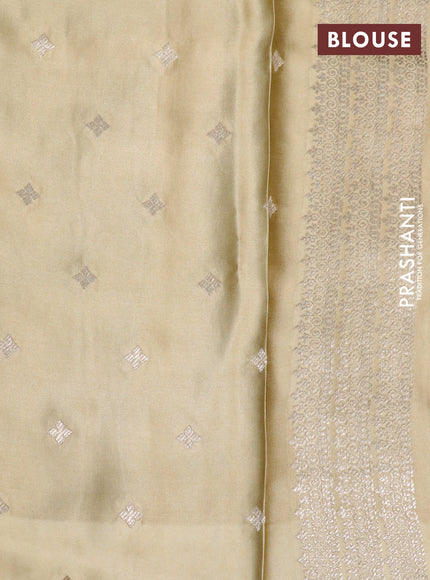 Mushru silk saree pale yellow with zari woven buttas and zari woven butta border