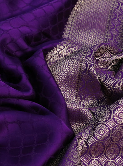 Mushru silk saree violet with allover self emboss and zari woven butta border