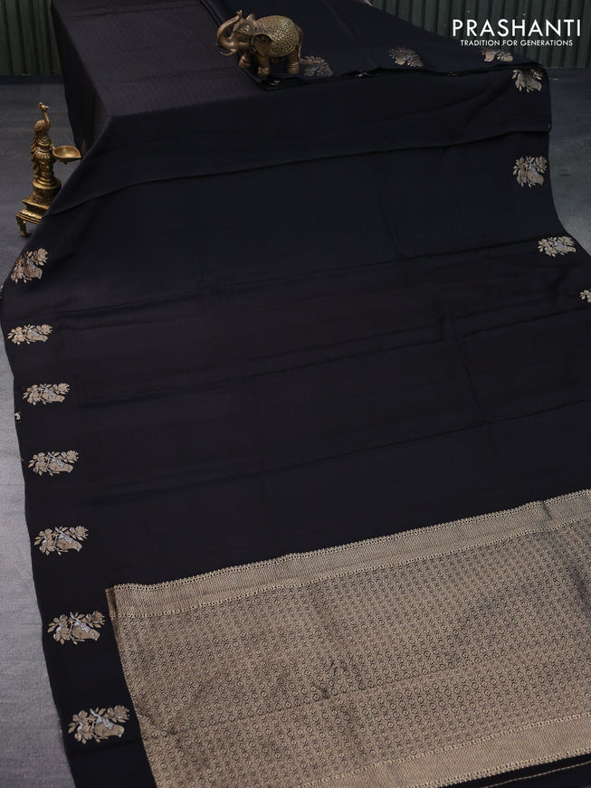 Mushru silk saree black with allover self emboss and zari woven butta border