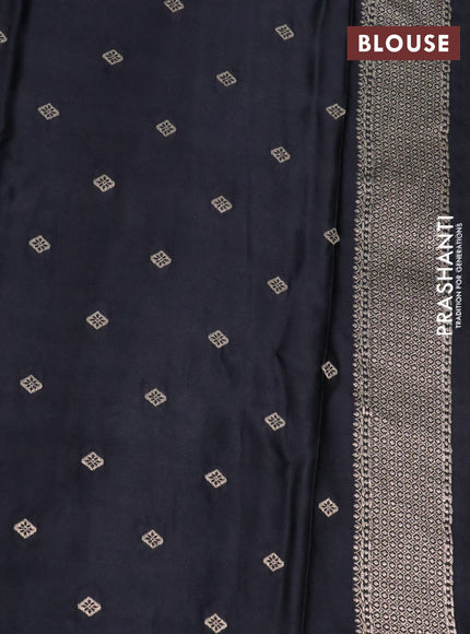 Mushru silk saree black with allover self emboss and zari woven butta border