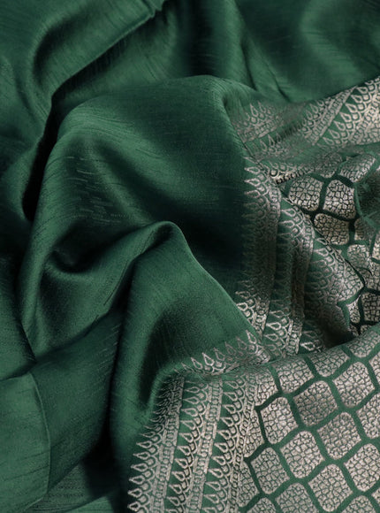 Mushru silk saree green with allover self emboss and zari woven butta border