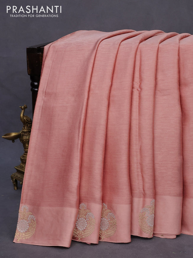 Mushru silk saree peach shade with allover self emboss and zari woven butta border