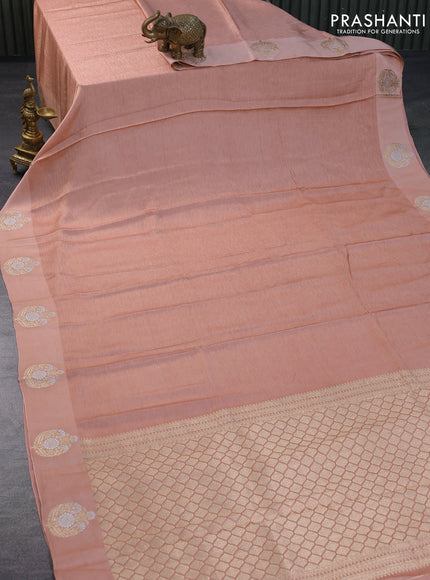 Mushru silk saree peach shade with allover self emboss and zari woven butta border