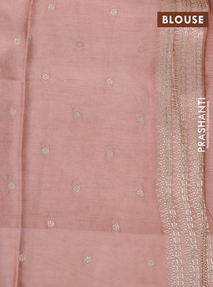 Mushru silk saree peach shade with allover self emboss and zari woven butta border