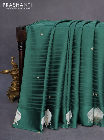 Mushru silk saree green with allover stripe pattern & zari buttas and zari woven butta border