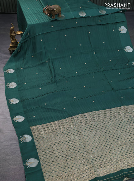 Mushru silk saree green with allover stripe pattern & zari buttas and zari woven butta border