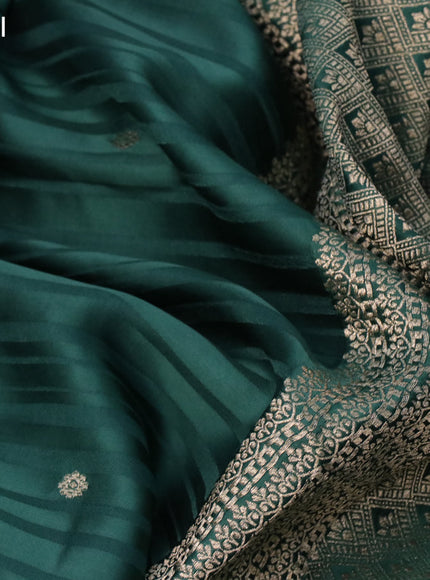 Mushru silk saree green with allover stripe pattern & zari buttas and zari woven butta border