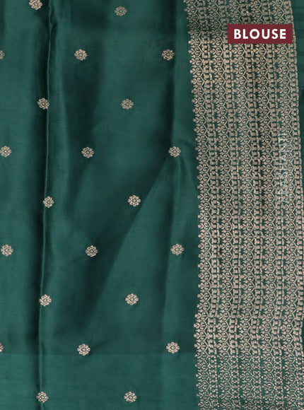 Mushru silk saree green with allover stripe pattern & zari buttas and zari woven butta border