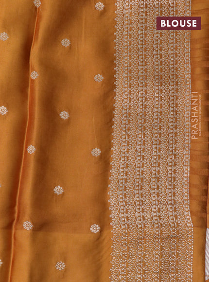 Mushru silk saree dark mustard with allover stripe pattern & zari buttas and zari woven butta border