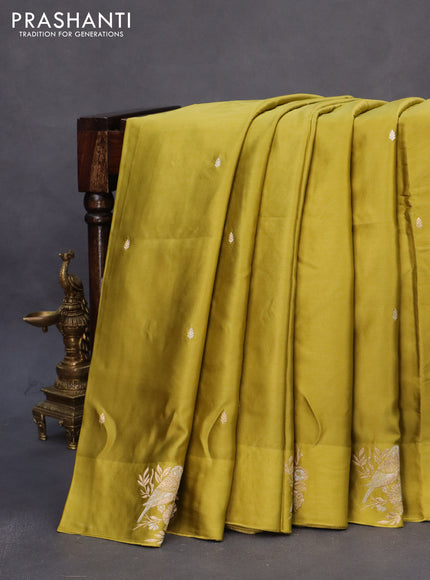 Mushru silk saree lime yellow with zari woven buttas and zari woven butta border