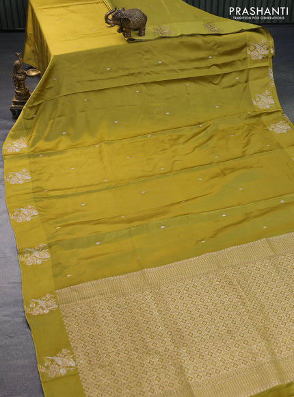 Mushru silk saree lime yellow with zari woven buttas and zari woven butta border