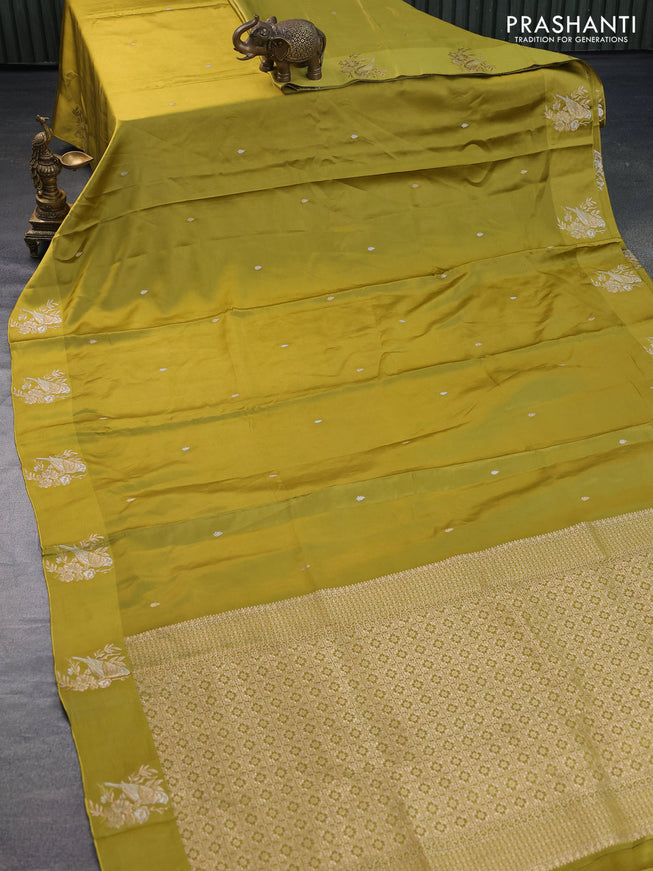 Mushru silk saree lime yellow with zari woven buttas and zari woven butta border