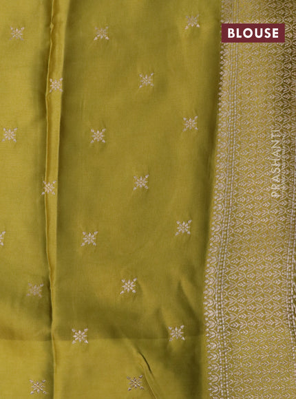 Mushru silk saree lime yellow with zari woven buttas and zari woven butta border