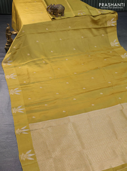 Mushru silk saree mustard green with zari woven buttas and zari woven butta border